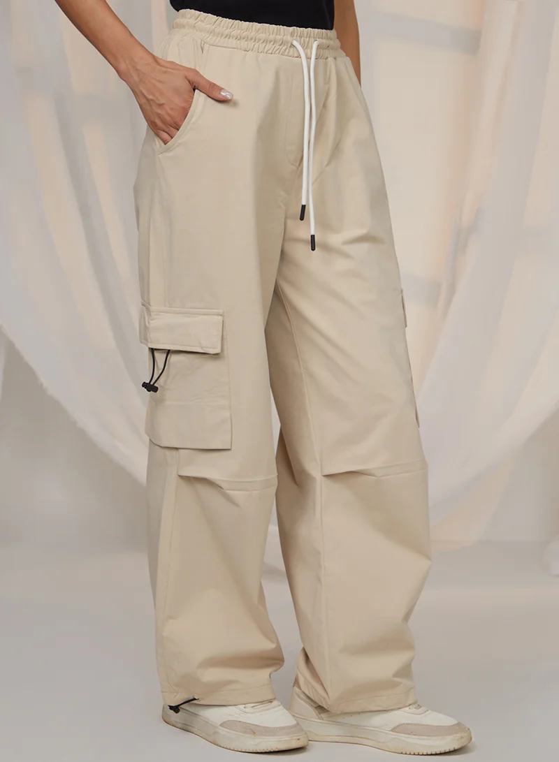 Pinacolada  Women's Beige Solid Cargo Parachute Trousers For Casual Wear | Mid-Rise | 4 Pockets | Drawstring Closure | Cargo Pants Designed With Comfortable Fit For Woman & Girls for Women | Best Price UAE